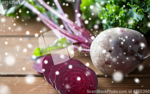 Image of close up of sliced beet on wood