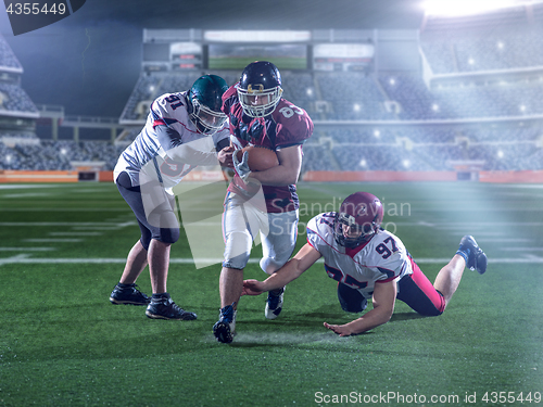 Image of Front view of American football players in action