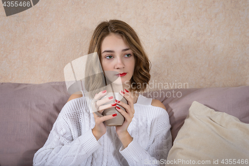 Image of Girl with a cup of coffee