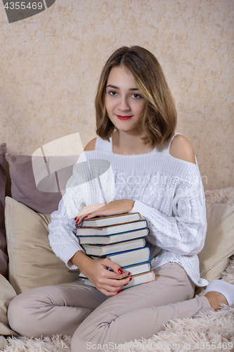 Image of The girl with books