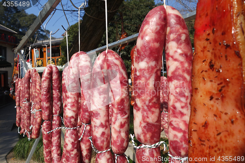 Image of The meat drying outside on the sun