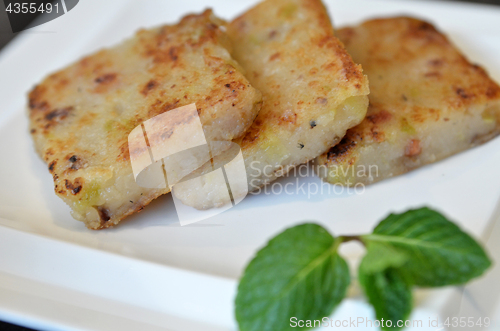 Image of Fried carrot cake on white plate