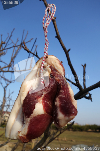 Image of The meat drying outside on the sun