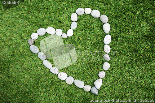 Image of Heart shape made of pebble stones