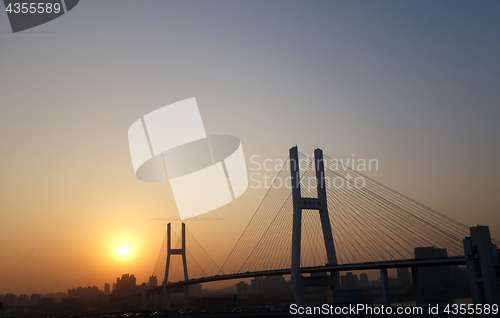 Image of Nanpu bridge in Shanghai over the sunset