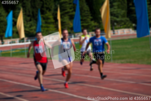 Image of Blurred view of man athletic running competition