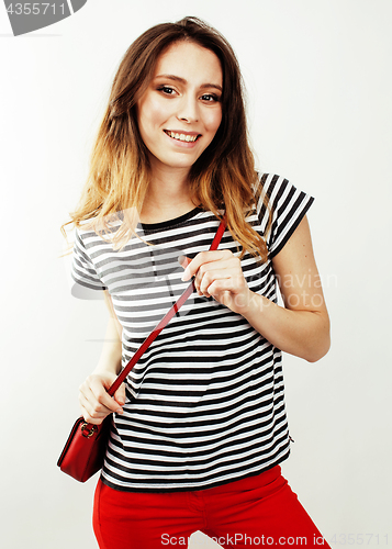 Image of young pretty stylish hipster girl posing emotional isolated on white background happy smiling cool smile, lifestyle people concept close up