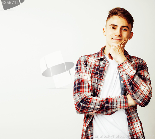 Image of young handsome teenage hipster guy posing emotional, happy smiling against white background isolated, lifestyle people concept closeup
