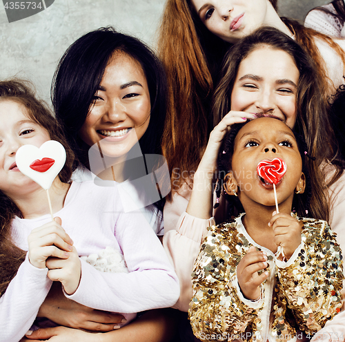 Image of Lifestyle and people concept: young pretty diversity nations woman with different age children celebrating on birth day party together happy smiling, making selfie. African-american, asian and caucasi
