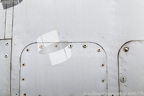 Image of metal surface with rivets
