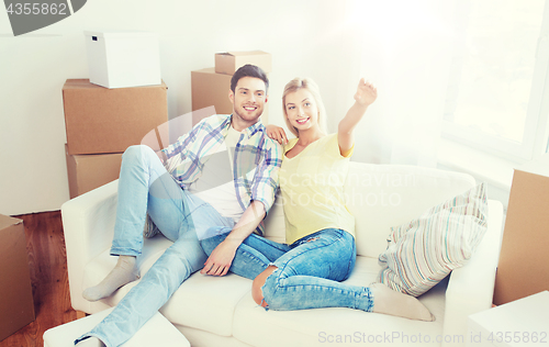 Image of couple with boxes moving to new home and dreaming