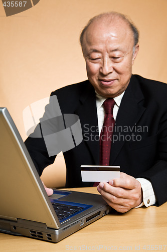Image of Businessman buying online