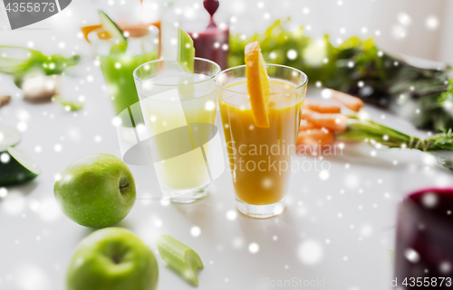 Image of glasses with different fruit or vegetable juices