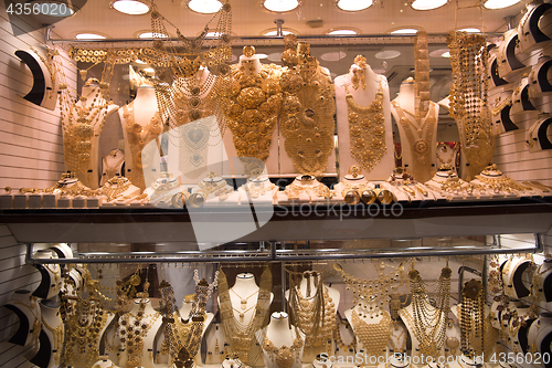 Image of gold jewelry in the shop window