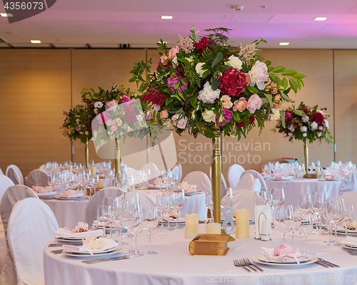 Image of Table set for wedding or another catered event dinner.