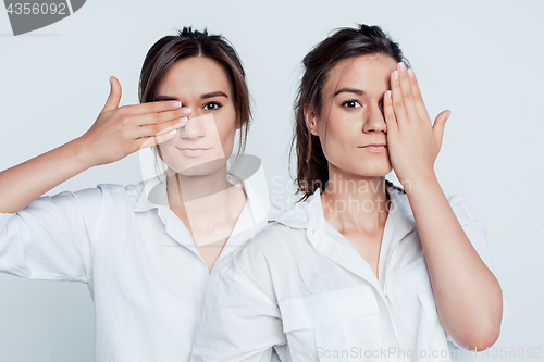 Image of Studio portrait of female twins