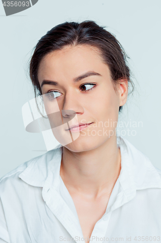 Image of The young woman\'s portrait with thoughtful emotions