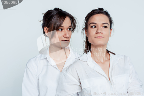 Image of Studio portrait of female twins