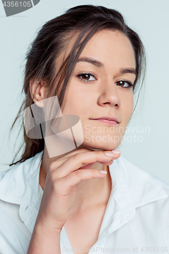 Image of The young woman\'s portrait with thoughtful emotions