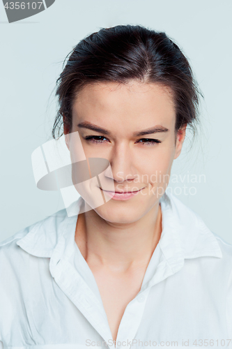 Image of The young woman\'s portrait with thoughtful emotions