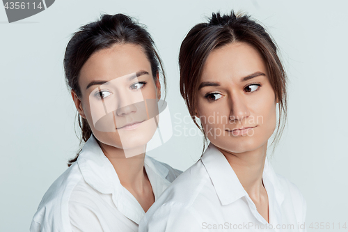 Image of Studio portrait of female twins