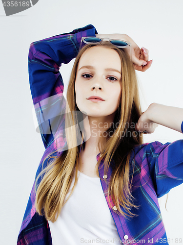 Image of young pretty teenage hipster girl posing emotional happy smiling on white background, lifestyle people concept 