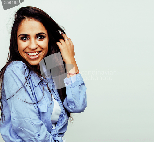 Image of young happy smiling latin american teenage girl emotional posing on white background, lifestyle people concept