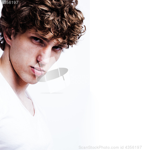 Image of young handsome teenage hipster guy posing emotional, happy smiling against white background isolated, lifestyle people concept closeup