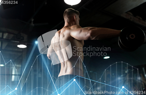 Image of close up of man with dumbbells exercising in gym