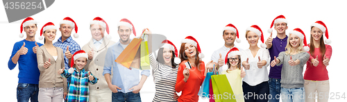 Image of people with shopping bags at christmas sale