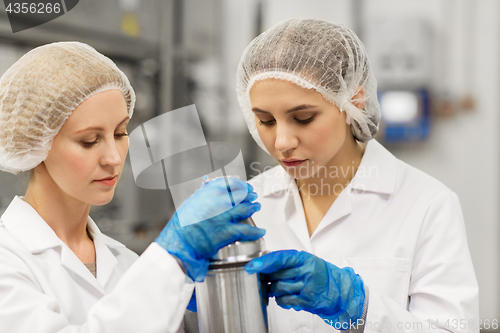 Image of women technologists working at ice cream factory