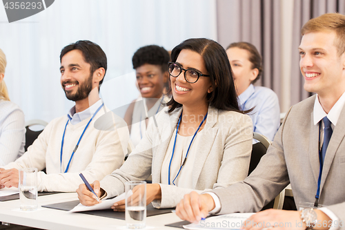 Image of happy business team at international conference