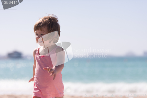 Image of little cute girl at beach