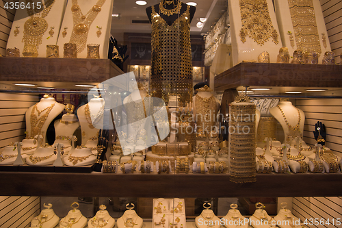 Image of gold jewelry in the shop window