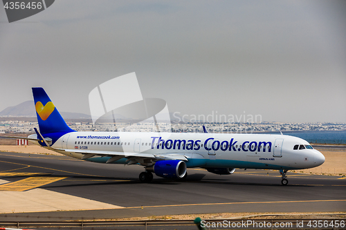 Image of ARECIFE, SPAIN - APRIL, 16 2017: AirBus A321 of ThomasCook.com w