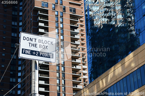 Image of DON’T BLOCK THE BOX street sign in New York City