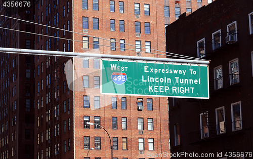 Image of Street sign for West 495 Expressway to Lincoln Tunnel