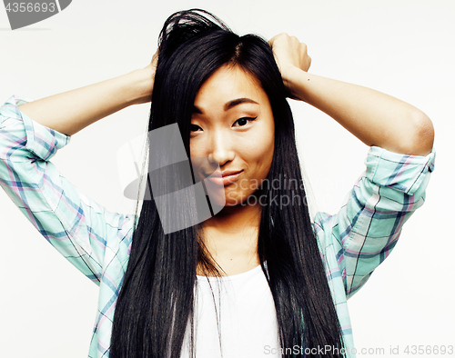 Image of young pretty asian woman posing cheerful emotional isolated on white background, lifestyle people concept closeup