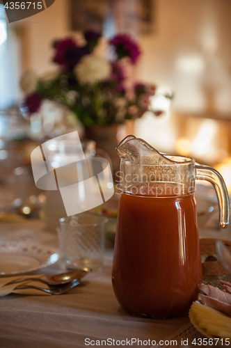 Image of Decorated table with jug of juice