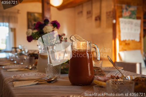 Image of Decorated table with jug of juice