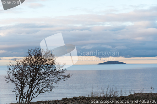 Image of Solitude blue island in calm water