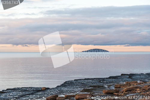 Image of Blue island in a calm seascape