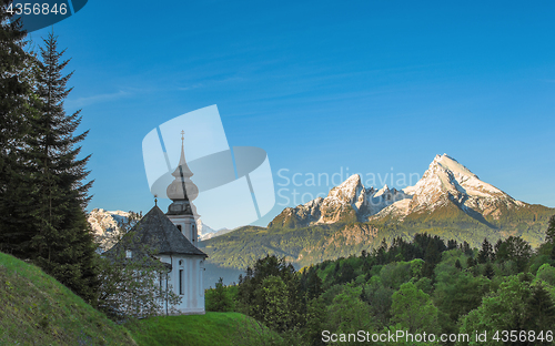 Image of Maria Gern chapel and snow-capped peaks of Watzmann mountain