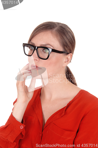 Image of Troubled  young woman with glasses in portrait