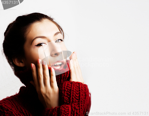 Image of young pretty woman in sweater and scarf all over her face, lifes