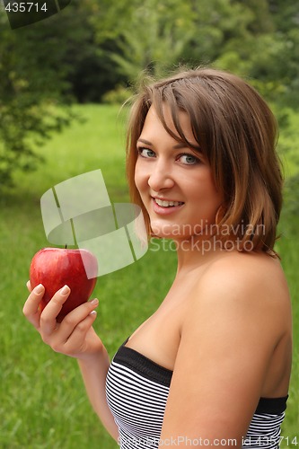 Image of Girl with red apple