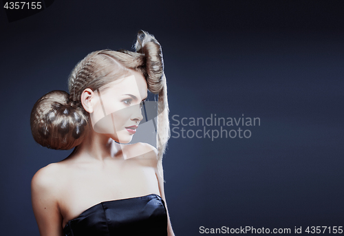Image of young elegant woman with creative hair style leopard print
