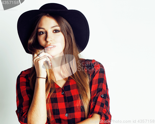 Image of young pretty brunette girl hipster in hat on white background casual close up dreaming smiling