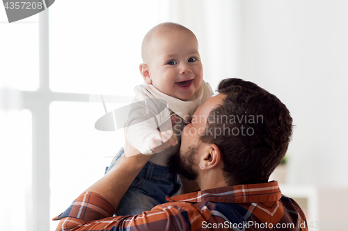 Image of happy little baby boy with father