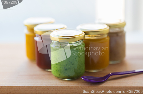 Image of vegetable or fruit puree or baby food in jars